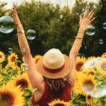 Woman in a Field of Sunflowers