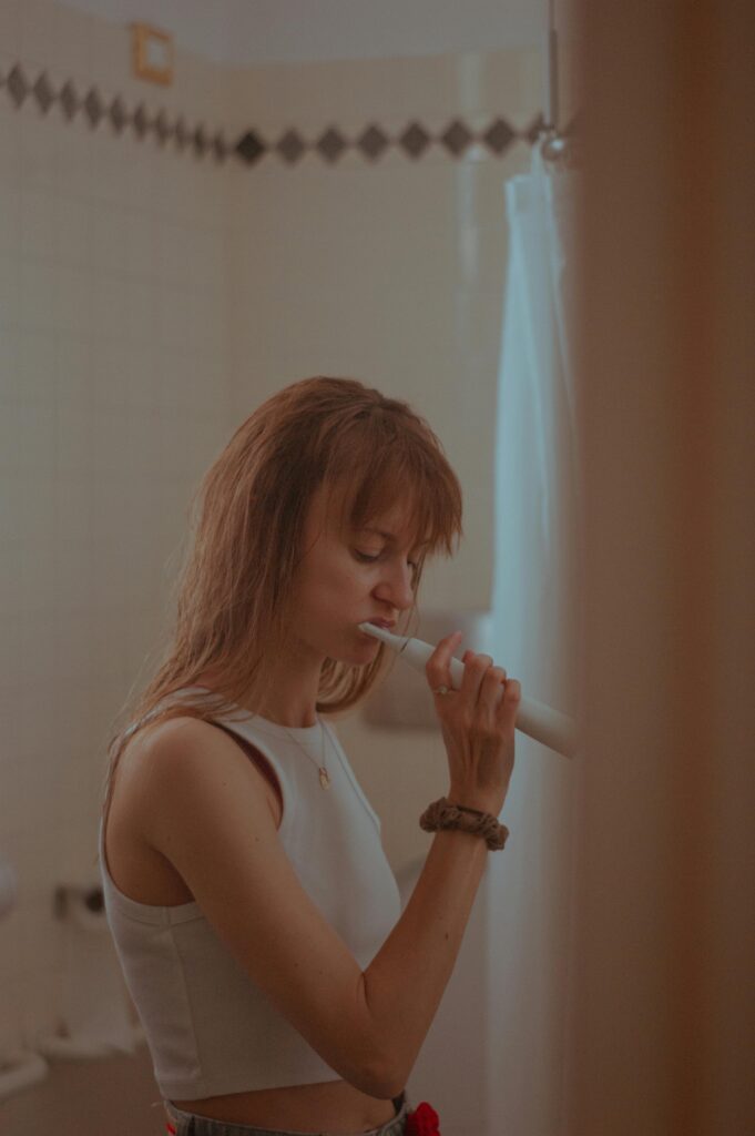 Woman Brushing Her Teeth