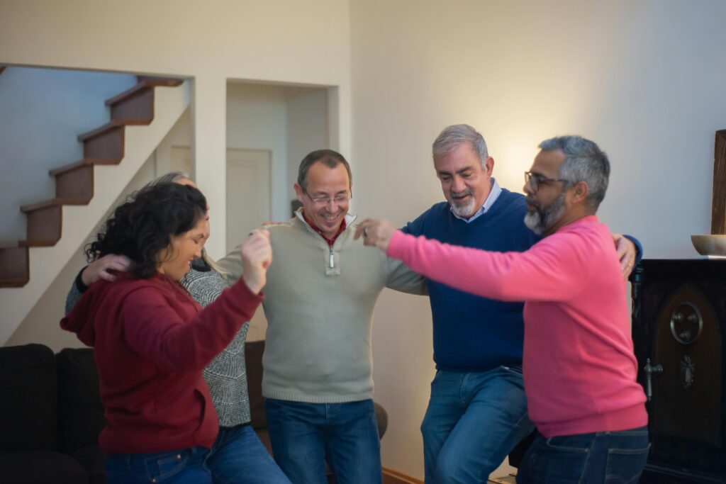 People Dancing in a Living Room