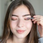 Woman Applying Eyeshadow