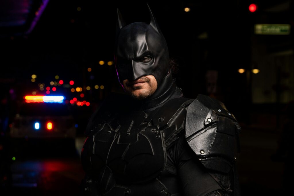 Photo of a Man Dressed As Batman