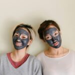 Two Women Wearing Skincare Facial Masks