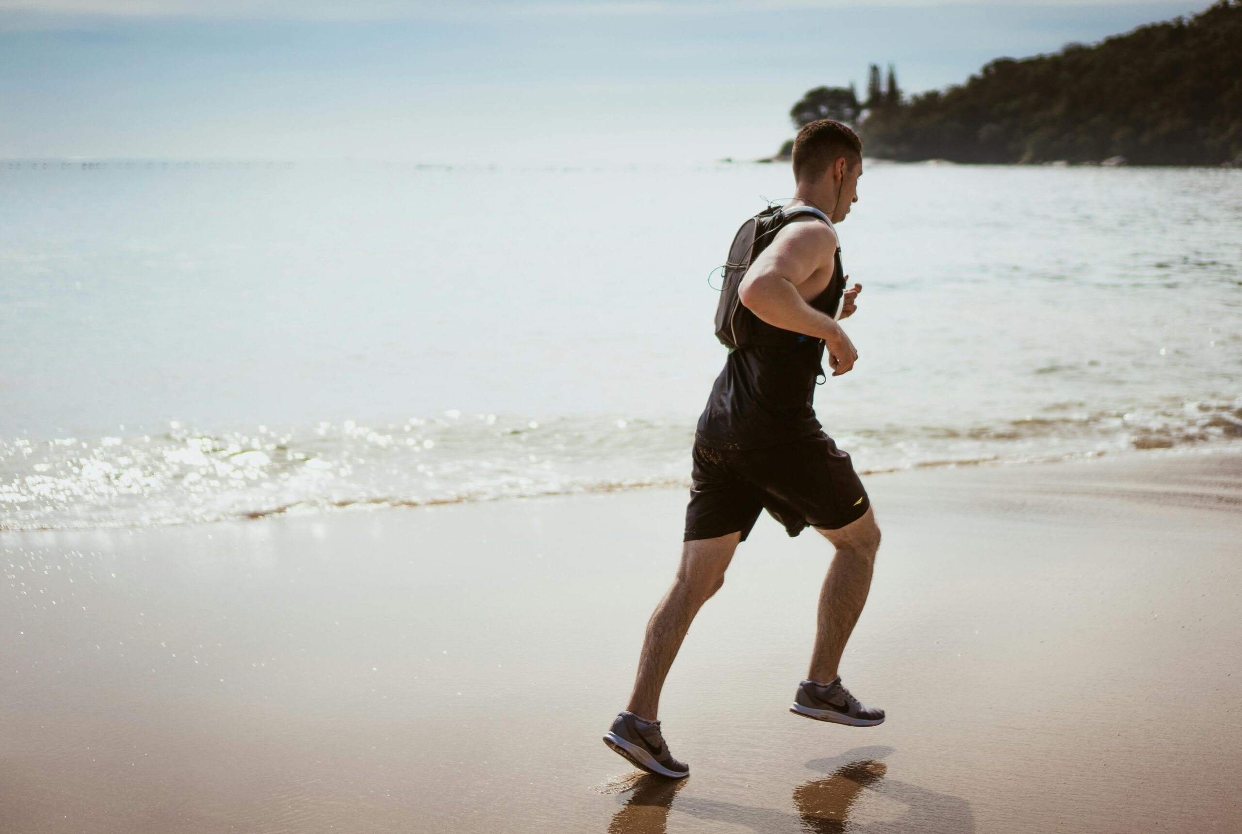 Man running on a beach