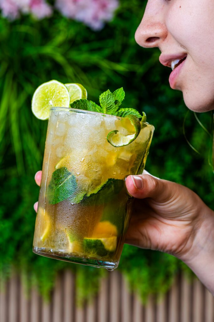 Woman Drinking a Mojito