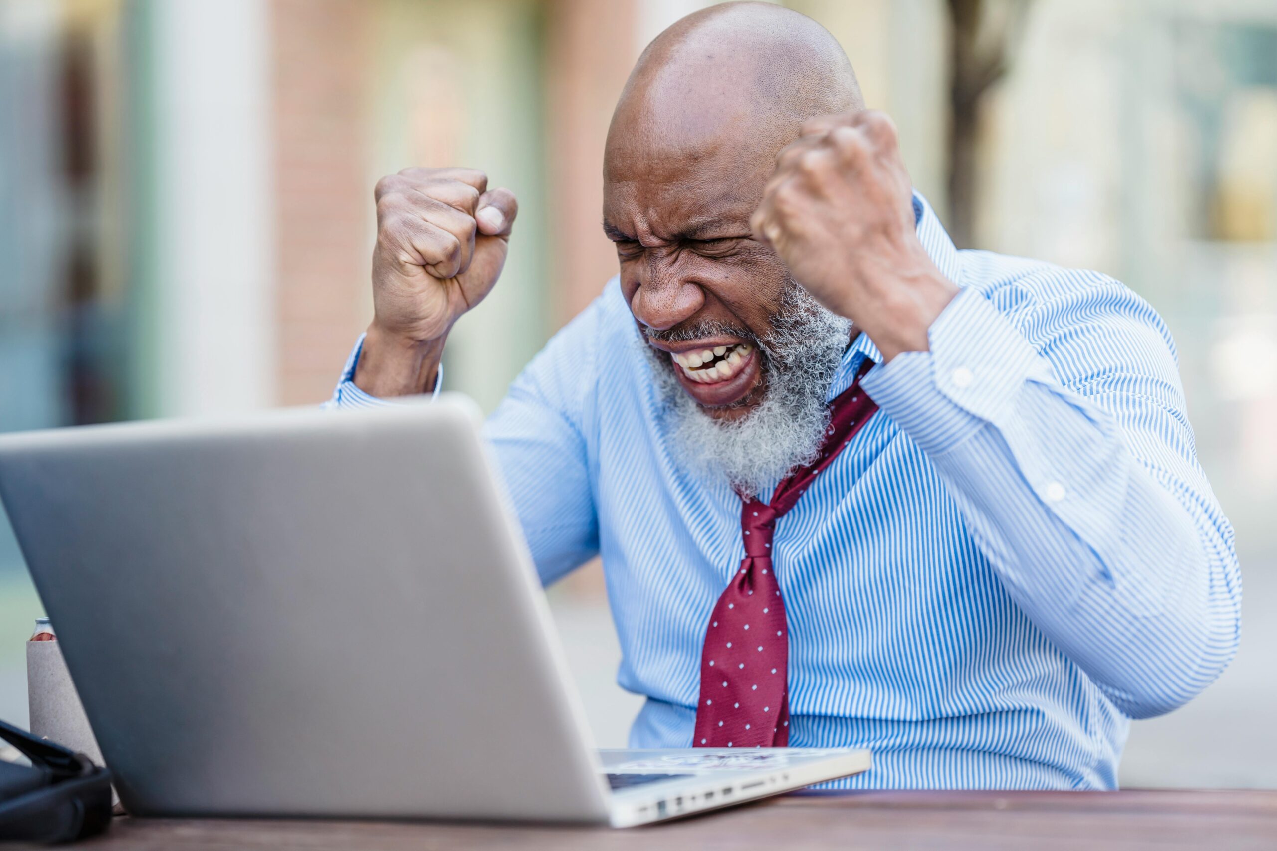 Man upset at his laptop