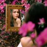 Girl Looking in Mirror