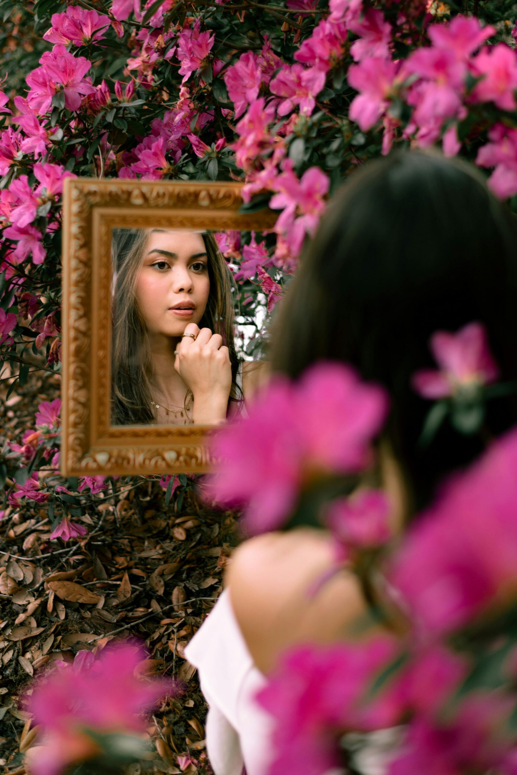 Girl looking in mirror