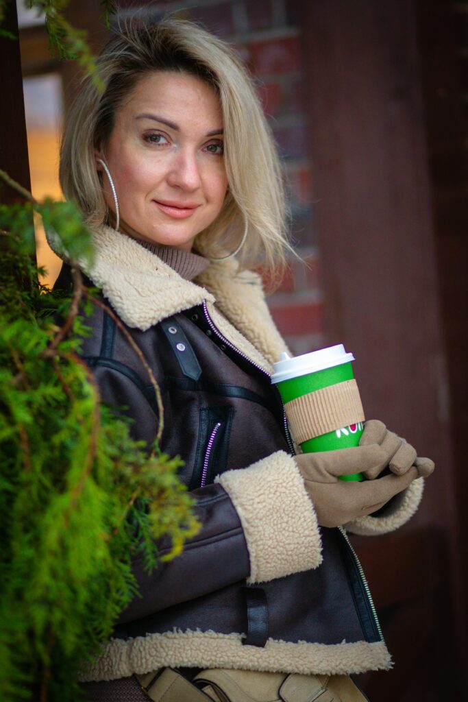 Woman in Fall Chill with Cup