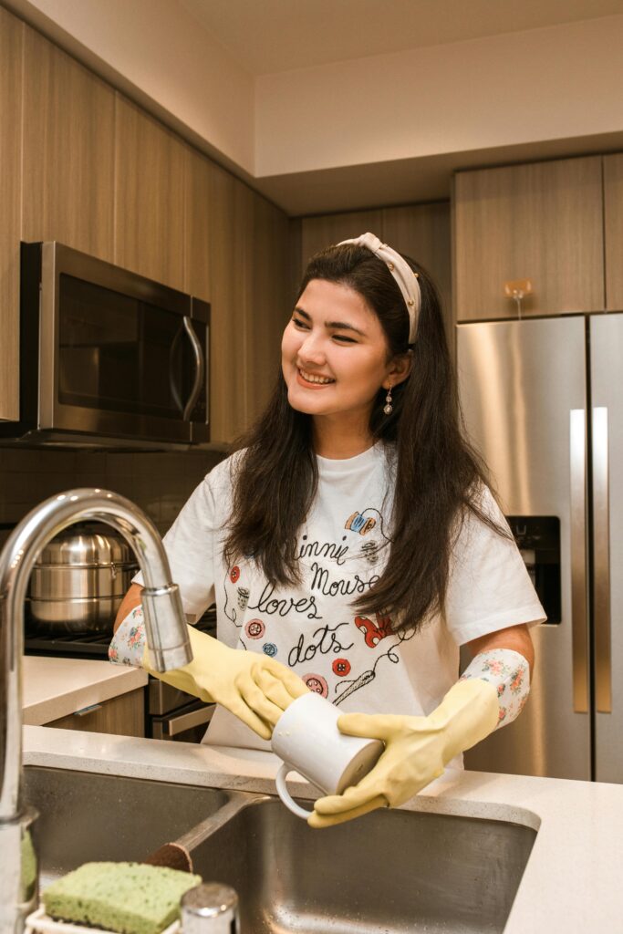 Girl Washing Dishes