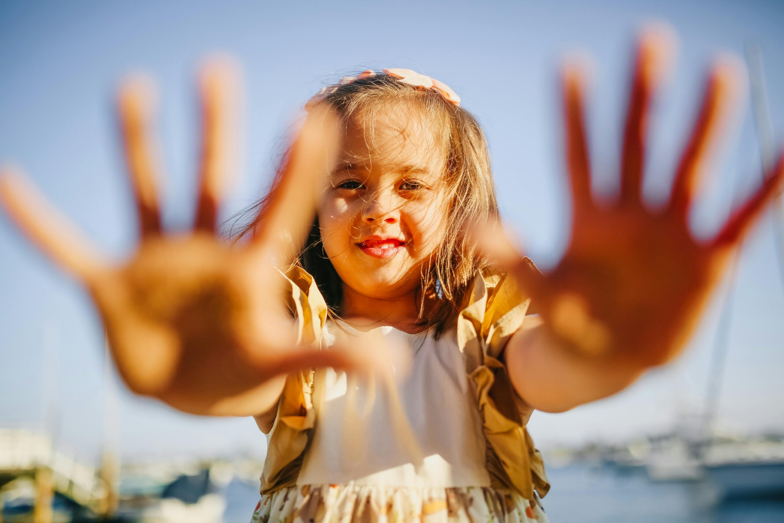 Photo of little girl with her hands out