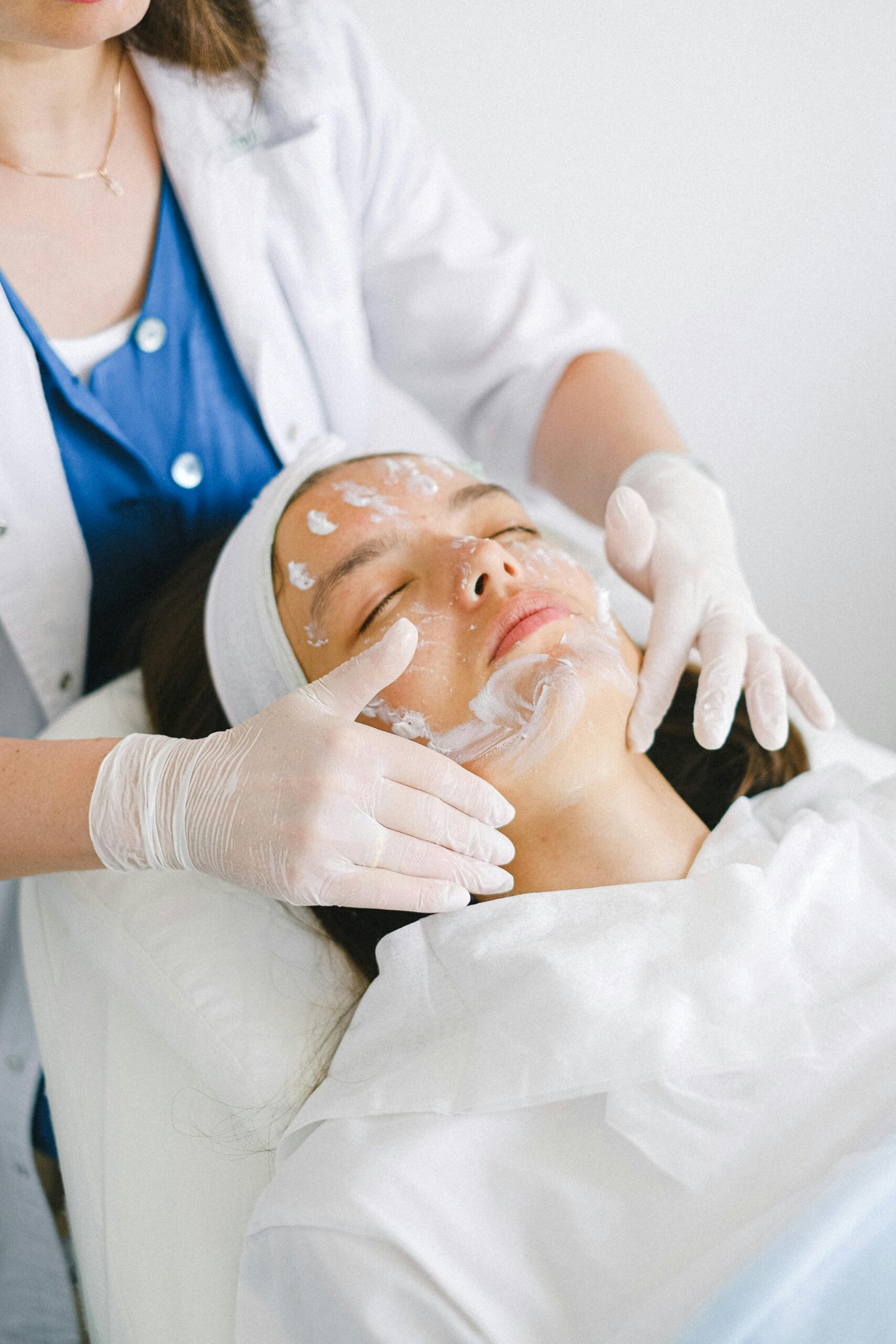 Woman receiving a facial massage