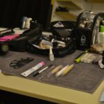 Various Makeup Items Laid out on a Dresser