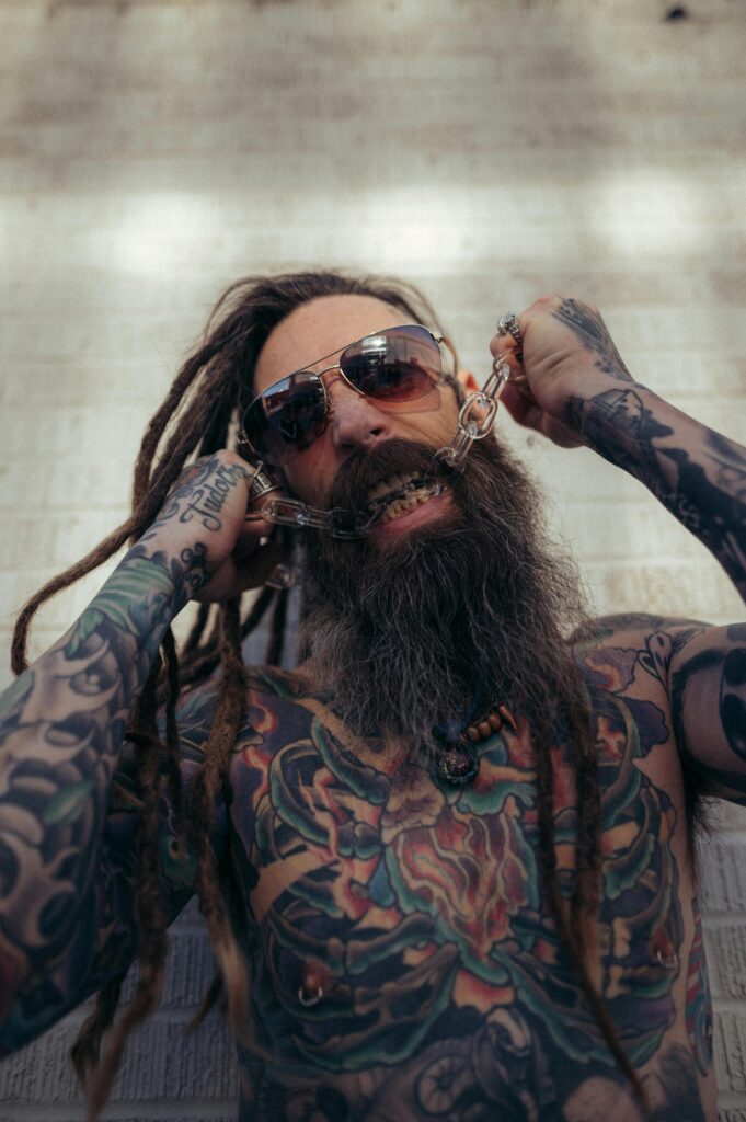 Man with Tattoos and Chain