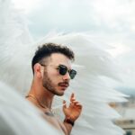 Man Surrounded by Angel Wings