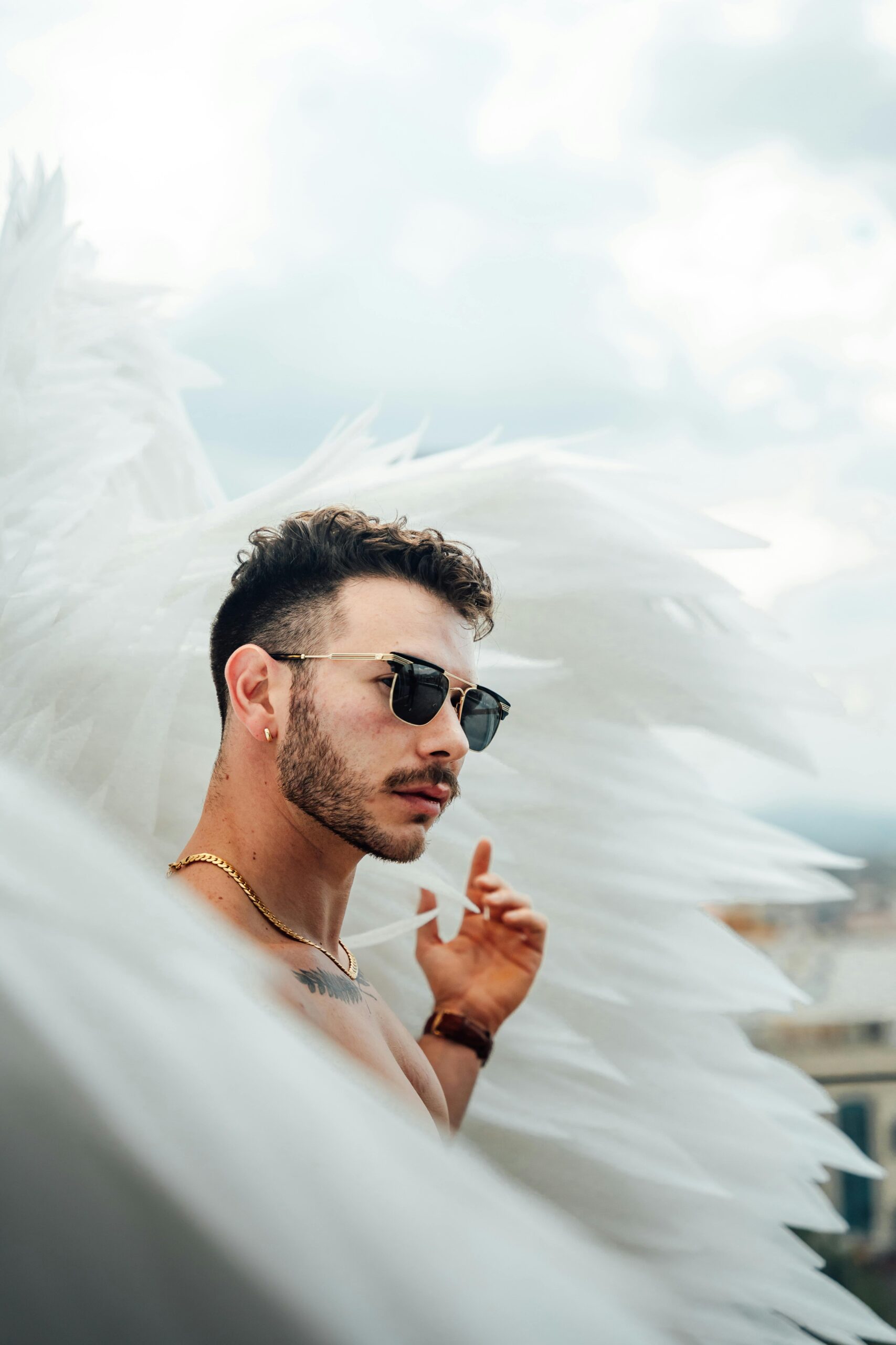 Man surrounded by Angel Wings