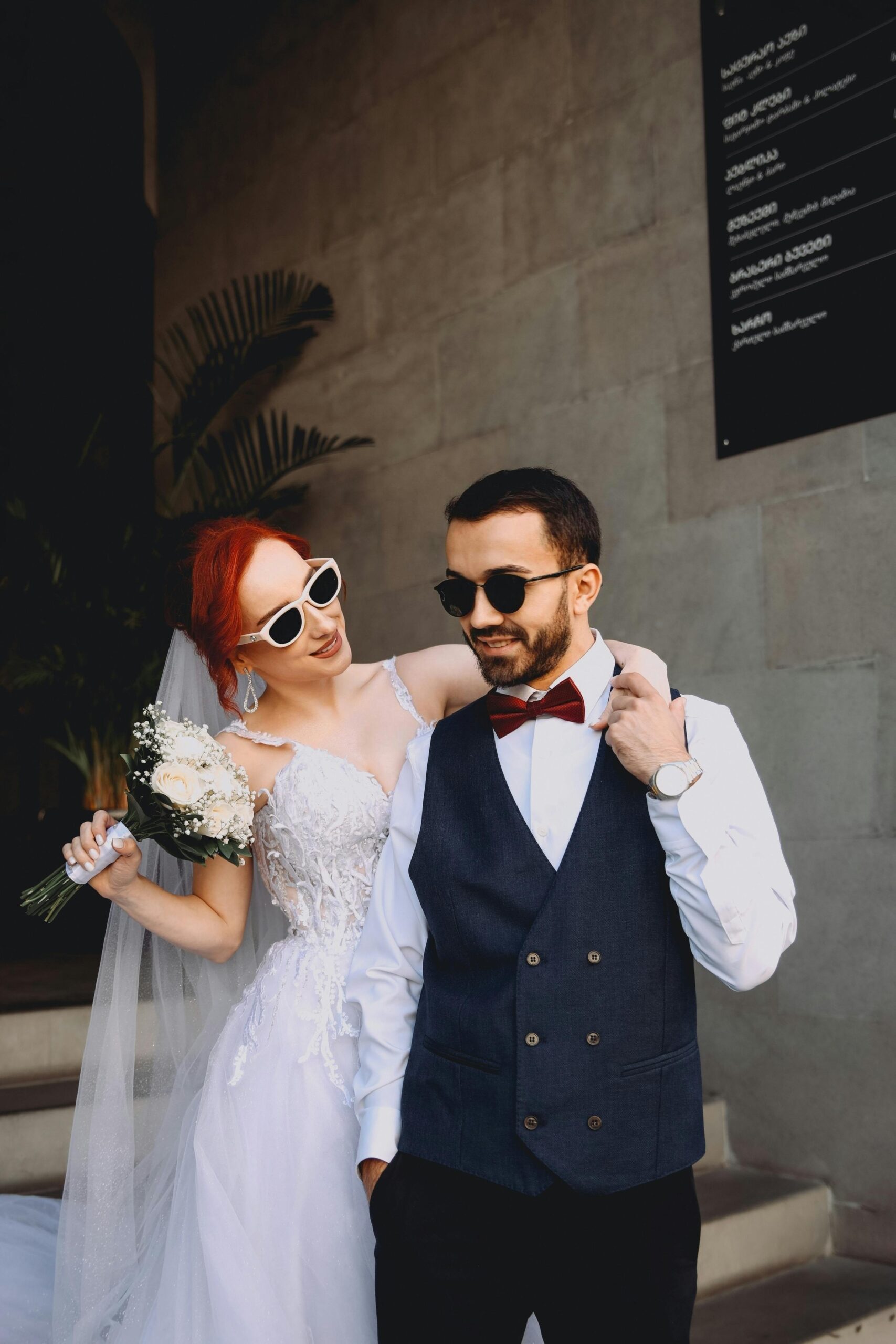 Wedding Etiquette 2024 bride and groom in shades