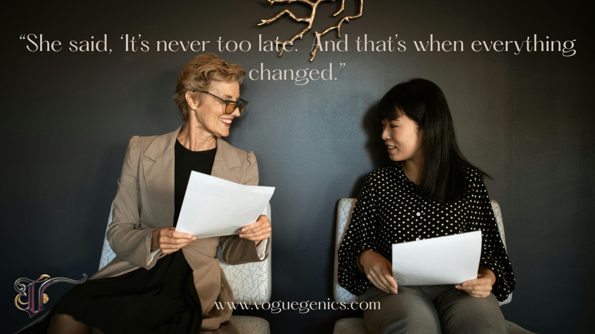 Two women sitting and smiling while holding documents, symbolizing a life-changing moment of encouragement and support.